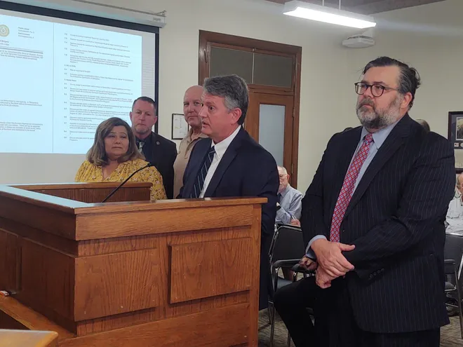 Grayson County Court-at-law Judge James Hendersion spoke to commissioners about seeking the grant that helped to pay for the jail's mental health coordinator position. Michael Hutchins / Herald Democrat